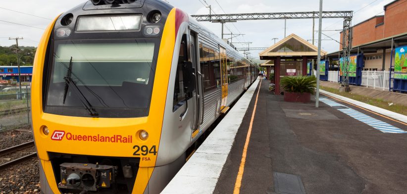 Queensland Rail train at station. | Newsreel