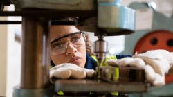 Woman working in factory. | Newsreel