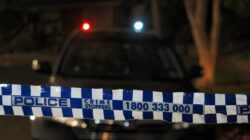 Police tape at crime scene with police car. | Newsreel