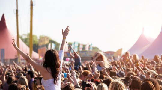 Crowd at music festival. | Newsreel