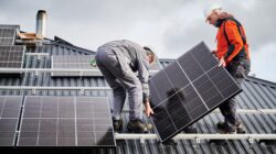 Rooftop solar being installed. | Newsreel