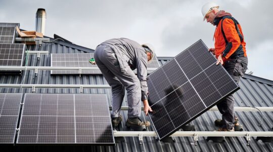 Rooftop solar being installed. | Newsreel