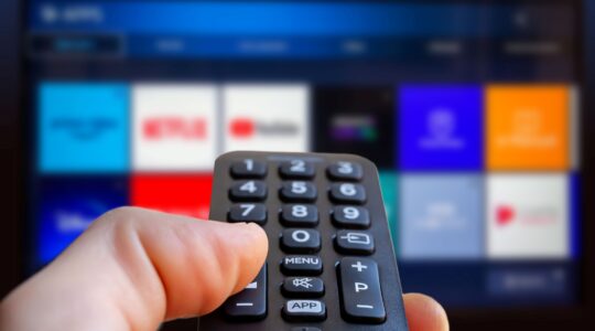 TV remote pointed at streaming services | Newseel