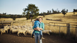 Woman and child on sheep station. | Newsreel