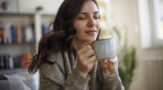 Women enjoying cup of coffee. | Newsreel