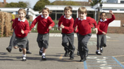 School children in playground. | Newsreel