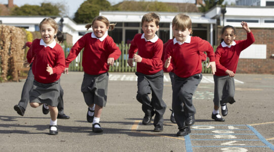 School children in playground. | Newsreel