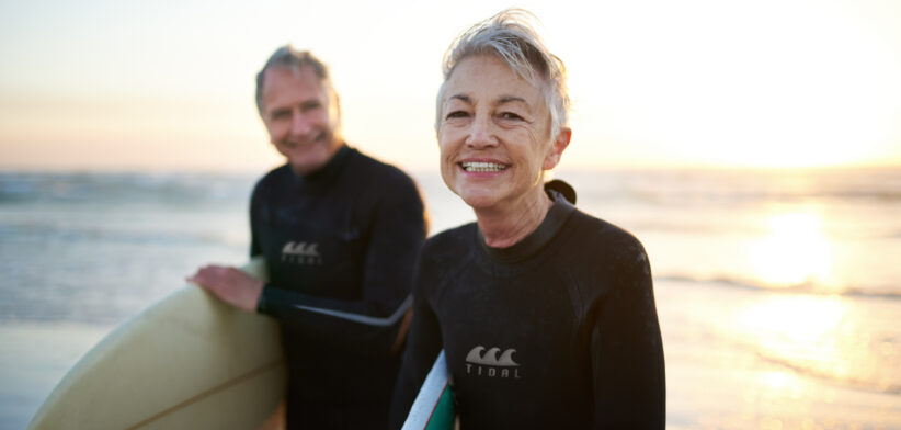 Mature age couple surfing. | Newsreel