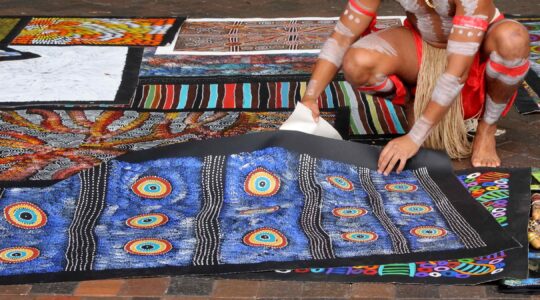 Aboriginal artist selling art. | Newsreel