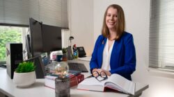 QUT Professor Cassandra Cross at desk | Newsreel