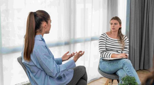 Woman providing support to another woman woman