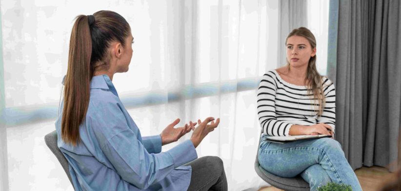 Woman providing support to another woman woman