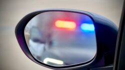 Emergency vehicle lights in side mirror