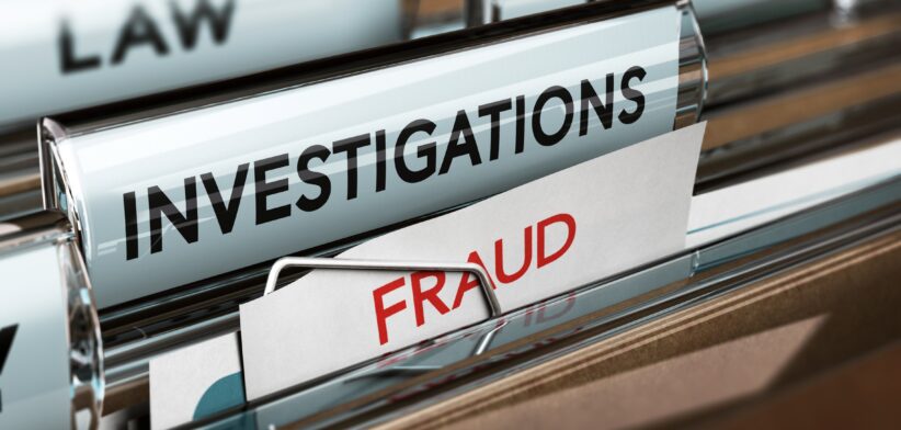 Fraud tag in filing cabinet. | Newsreel