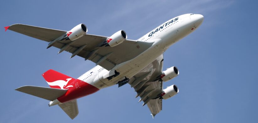 Qantas plane in the air.| Newsreel