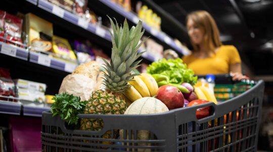 Shopping trolley full of fruit and vegetables. | Newsreel