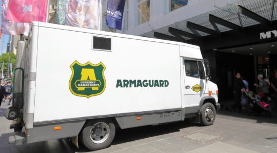 Armaguard truck. | Newsreel