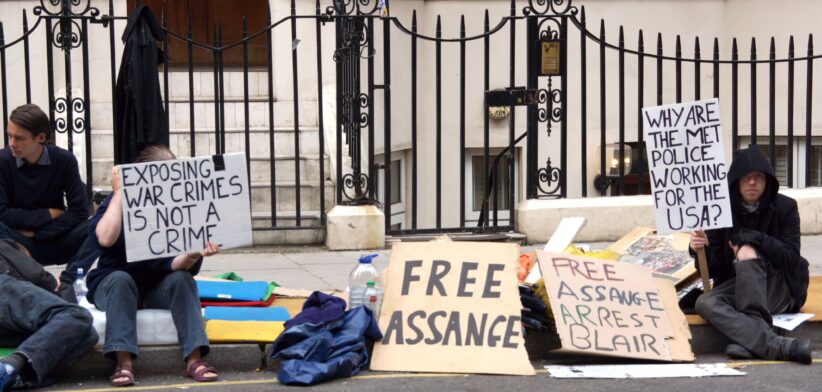 Julian Assange supporters opposite the Embassy of Ecuador in London. | Newsreel