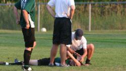 Injured football player. | Newsreel