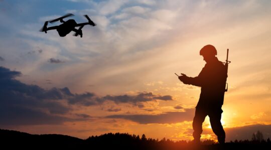 Soldier operating a drone. Newsreel