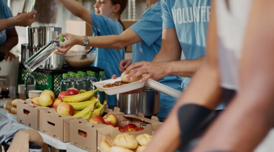 Volunteers provide food relief. | Newsreel