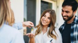 Young couple given keys to home. | Newsreel