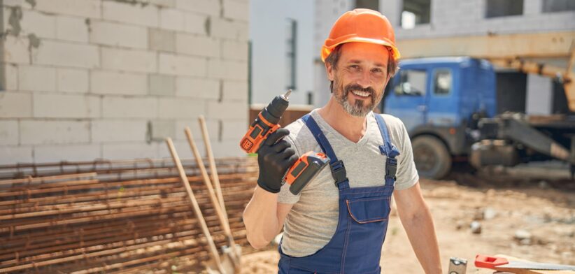 Middle age man on construction site.