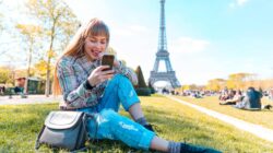 Woman in front of Eiffel Tower. | Newsreel