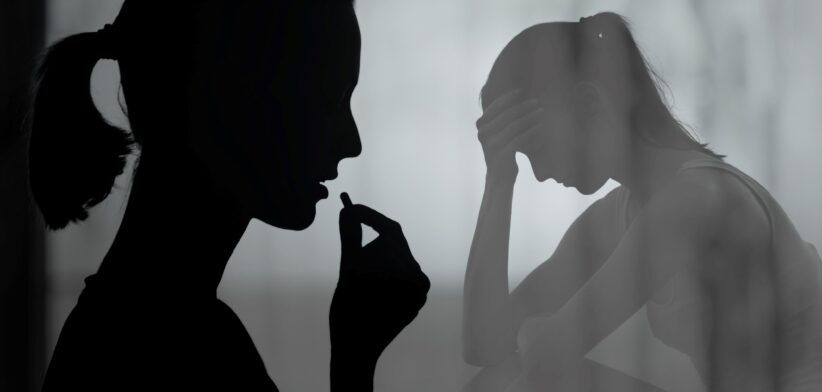 Women taking pill in shadows. | Newsreel