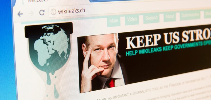 Wikileaks website and Julian Assange photo. | Newsreel