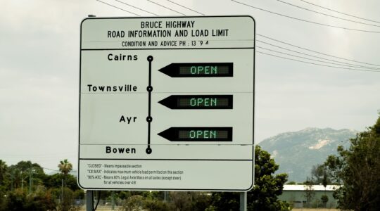 Bruce Highway sign. | Newsreel