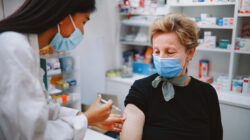 Woman receiving injection. | Newsreel