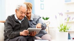 Elderly couple using an computer tablet. | Newsreel