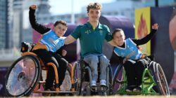 Wheelchair basketballer Eithen Leard with Suncoast Spinners players Kayden (10) and Riley (8) | Newsreel