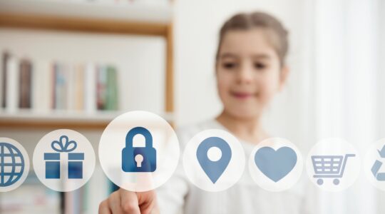 Child with security icon. | Newsreel