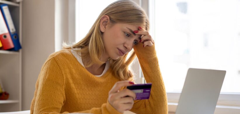 Woman worried about credit card. | Newsreel