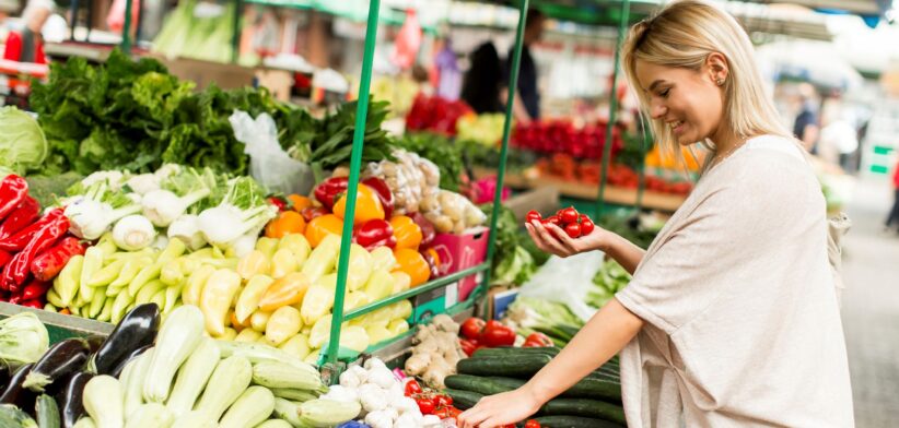 Women shopping for vegetables. | Newsreel