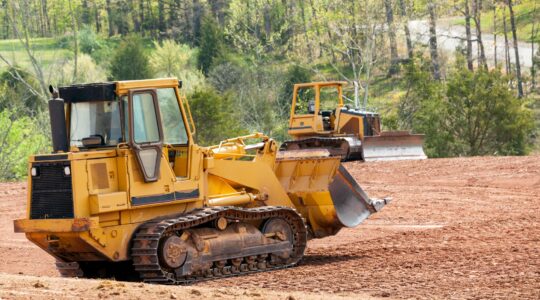 Bulldozers clearing land. | Newsreel