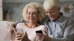 Elderly couple on mobile phones. | Newsreel