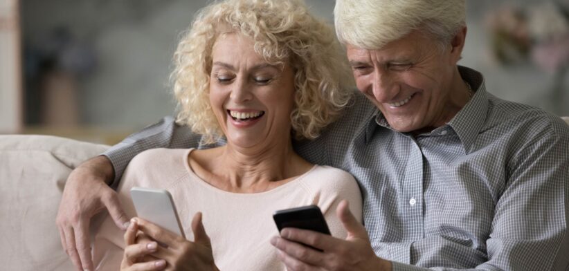 Elderly couple on mobile phones. | Newsreel