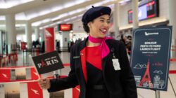 Qantas employee at Perth airport. | Newsreel