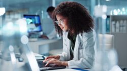 Researcher on computer. | Newsreel