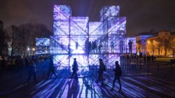 Violetly lit cubic installations in the Esplanade of Riga. | Newsreel