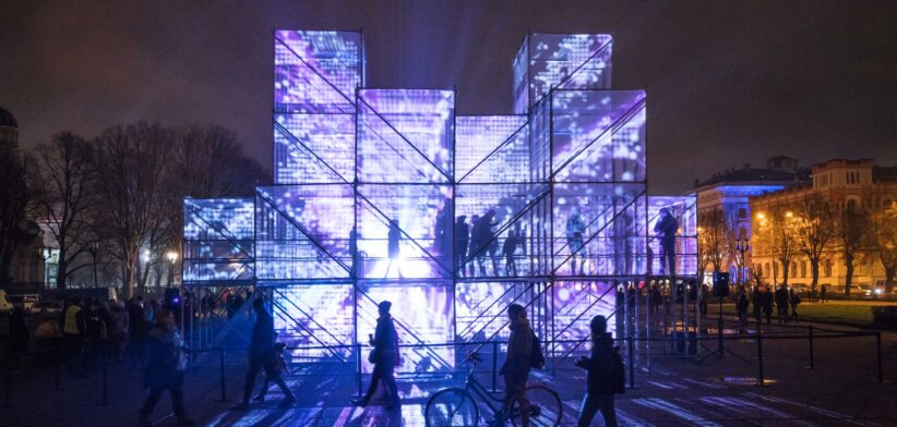 Violetly lit cubic installations in the Esplanade of Riga. | Newsreel