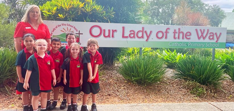 Our Lady of the Way School Petrie principal Aleisha Connellan with students. | Newsreel