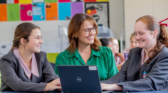 St John Fisher College Bracken Ridge principal Britt Gurnett and students. | Newsreel