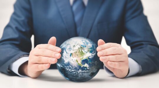 Businessman with globe of Earth