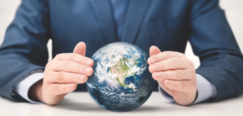 Businessman with globe of Earth