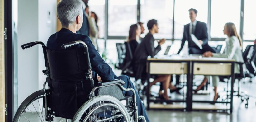 Worker in wheelchair excluded from meeting. | Newsreel