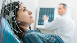 Woman undergoing an EEG. | Newsreel